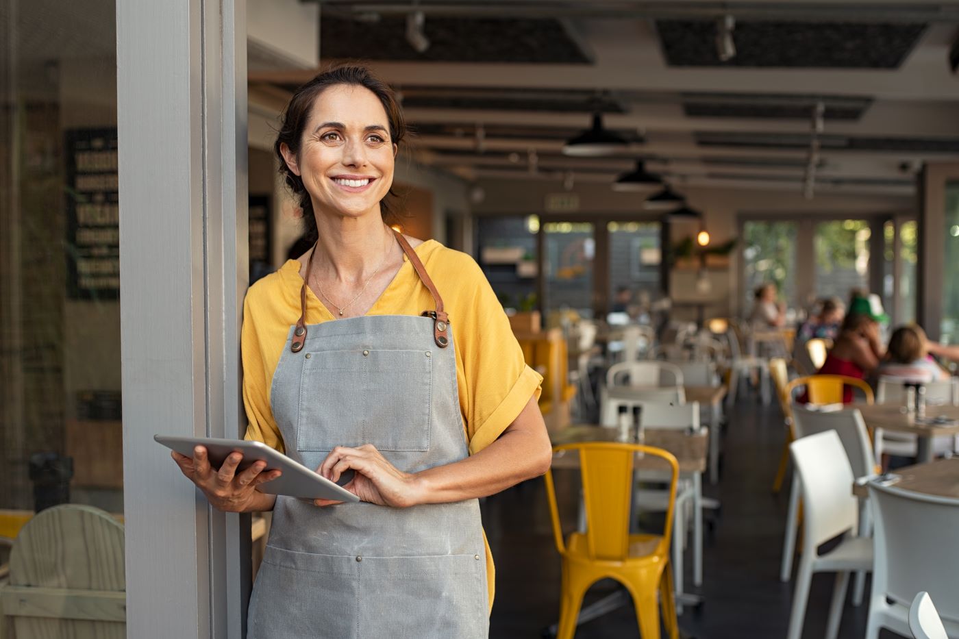 Man smiling in a restaurant